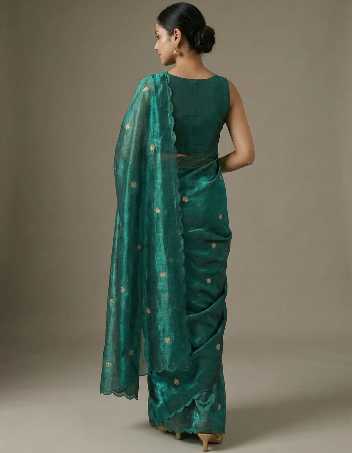 Regal Emerald Green Shimmer Saree with Embroidered Buttis and Scalloped Border