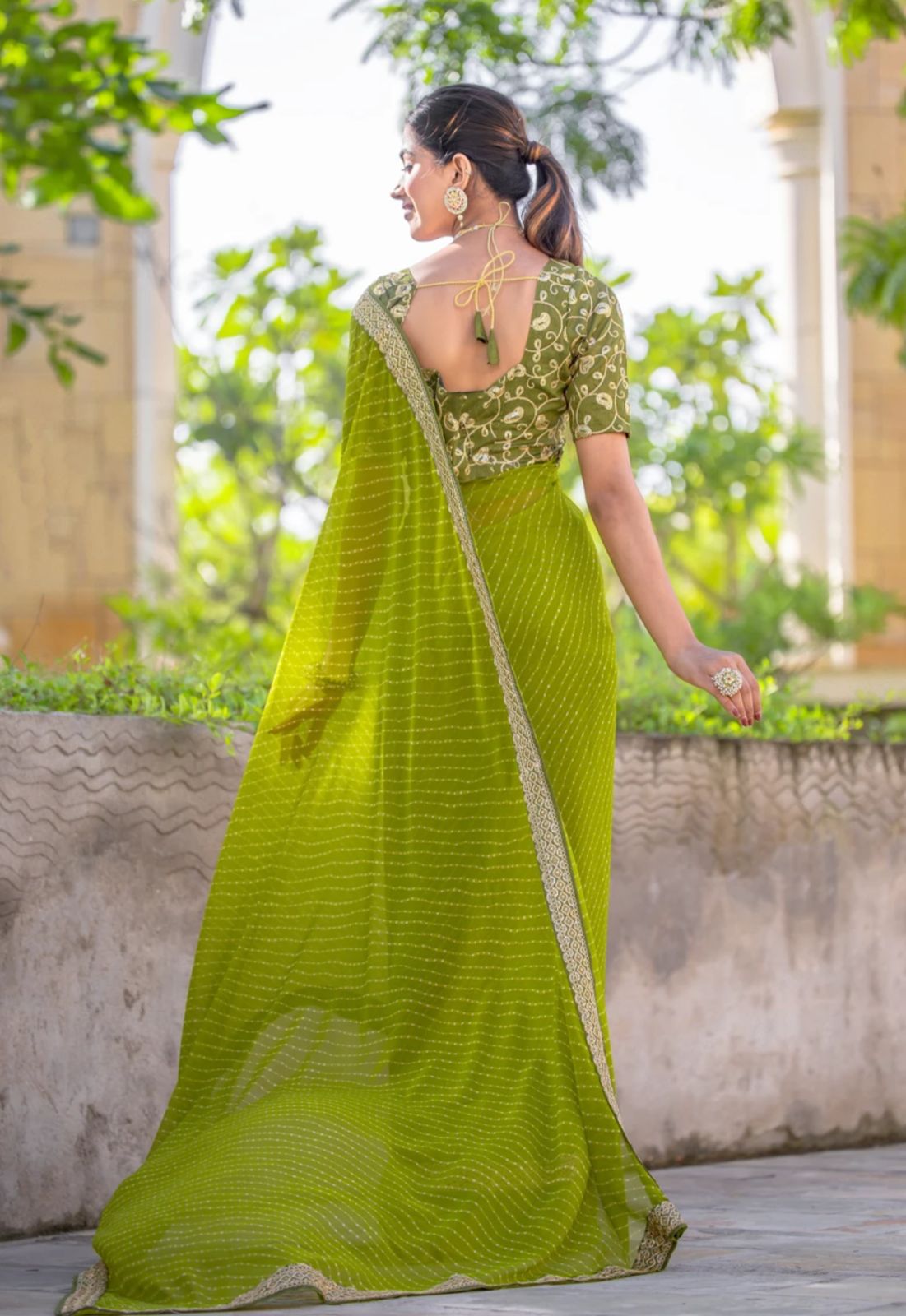 Festive Lime Green Striped Georgette Saree with Embroidered Lace Border