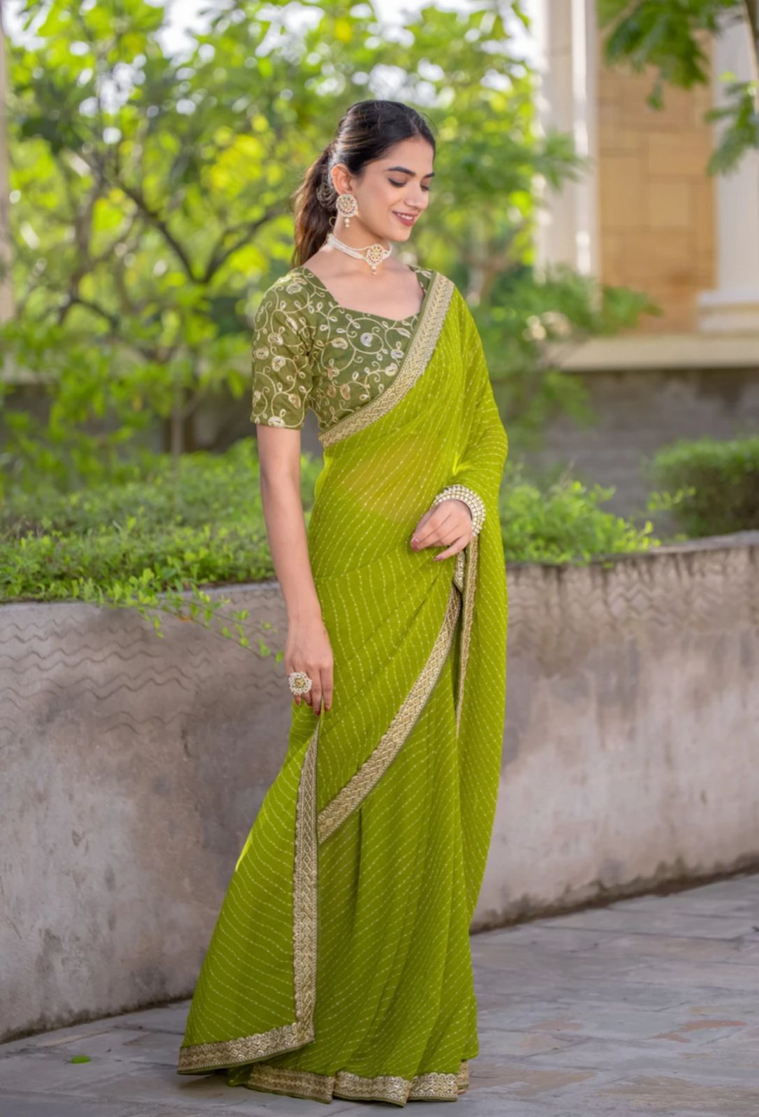 Festive Lime Green Striped Georgette Saree with Embroidered Lace Border